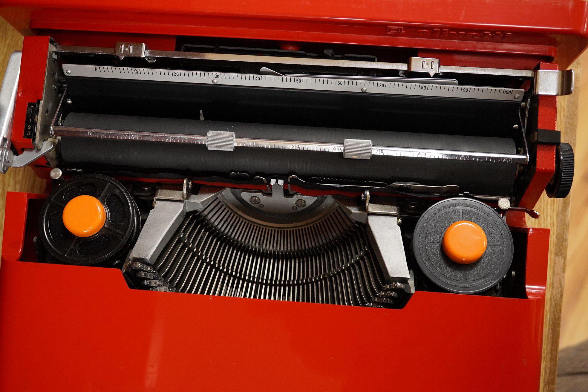 An Olivetti Valentine typewriter in red with tool case